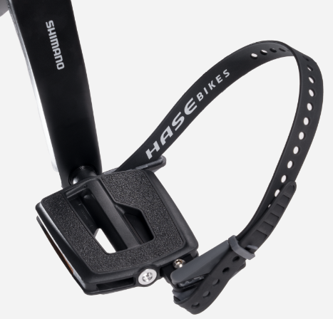 Pedals with heel strap